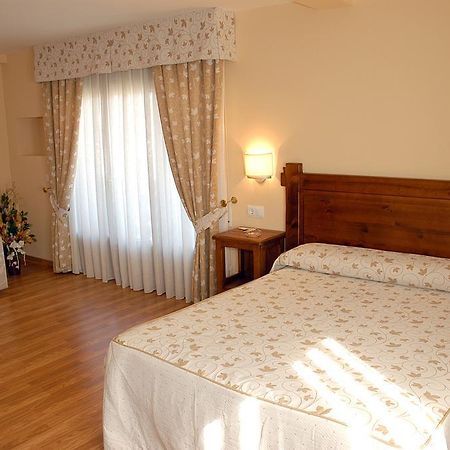 Aparthotel Tres Caminos Эль-Грао Номер фото
